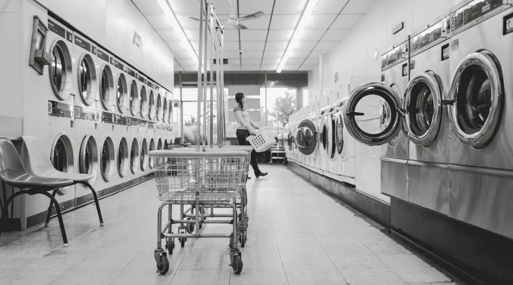 a woman does laundry