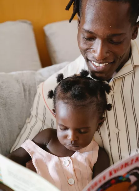 young black father with toddler