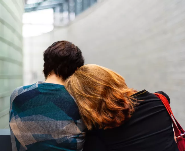 couple embracing with red hair