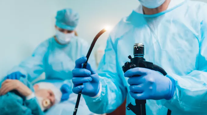 doctor holding medical device