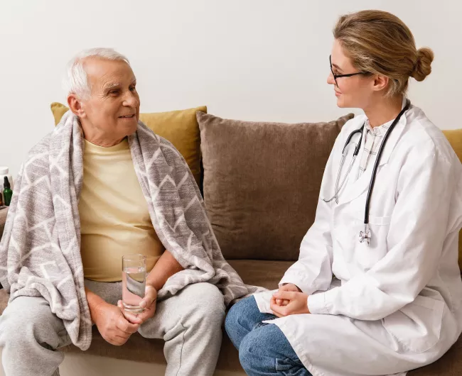 Doctor helps a patient