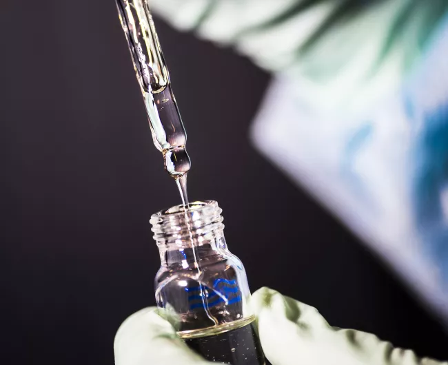 serum poured in a vial