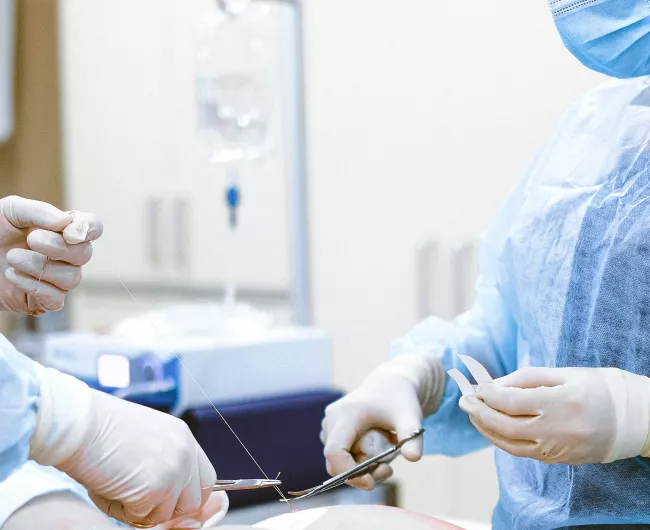 stitches with two doctors