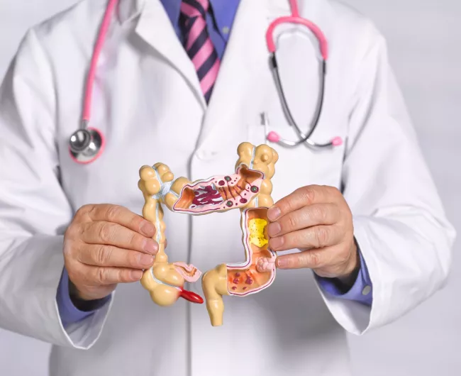 man holding digesting system